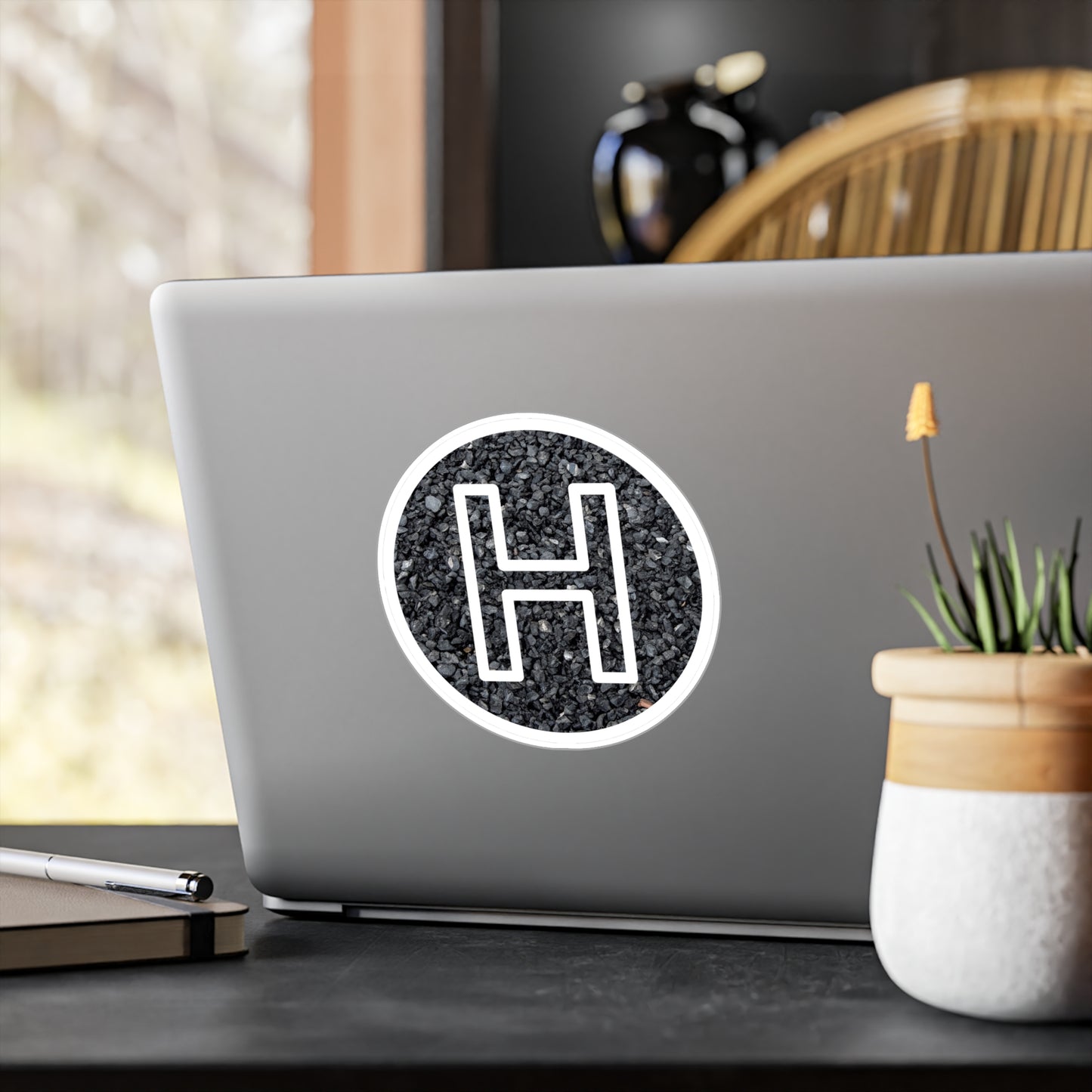 4" x 6" helipad vinyl sticker on a laptop