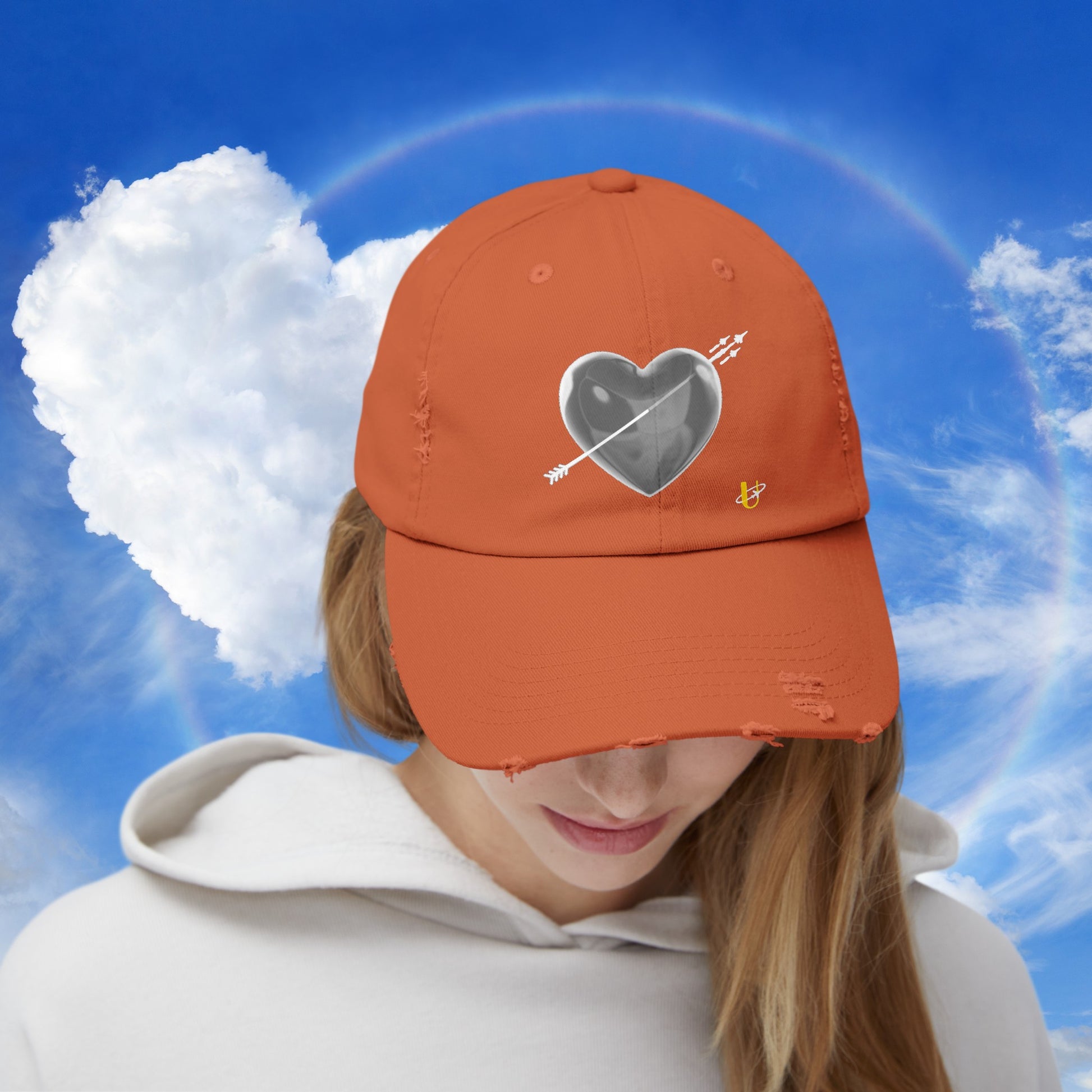 Woman wearing burnt orange "Love Jet hat