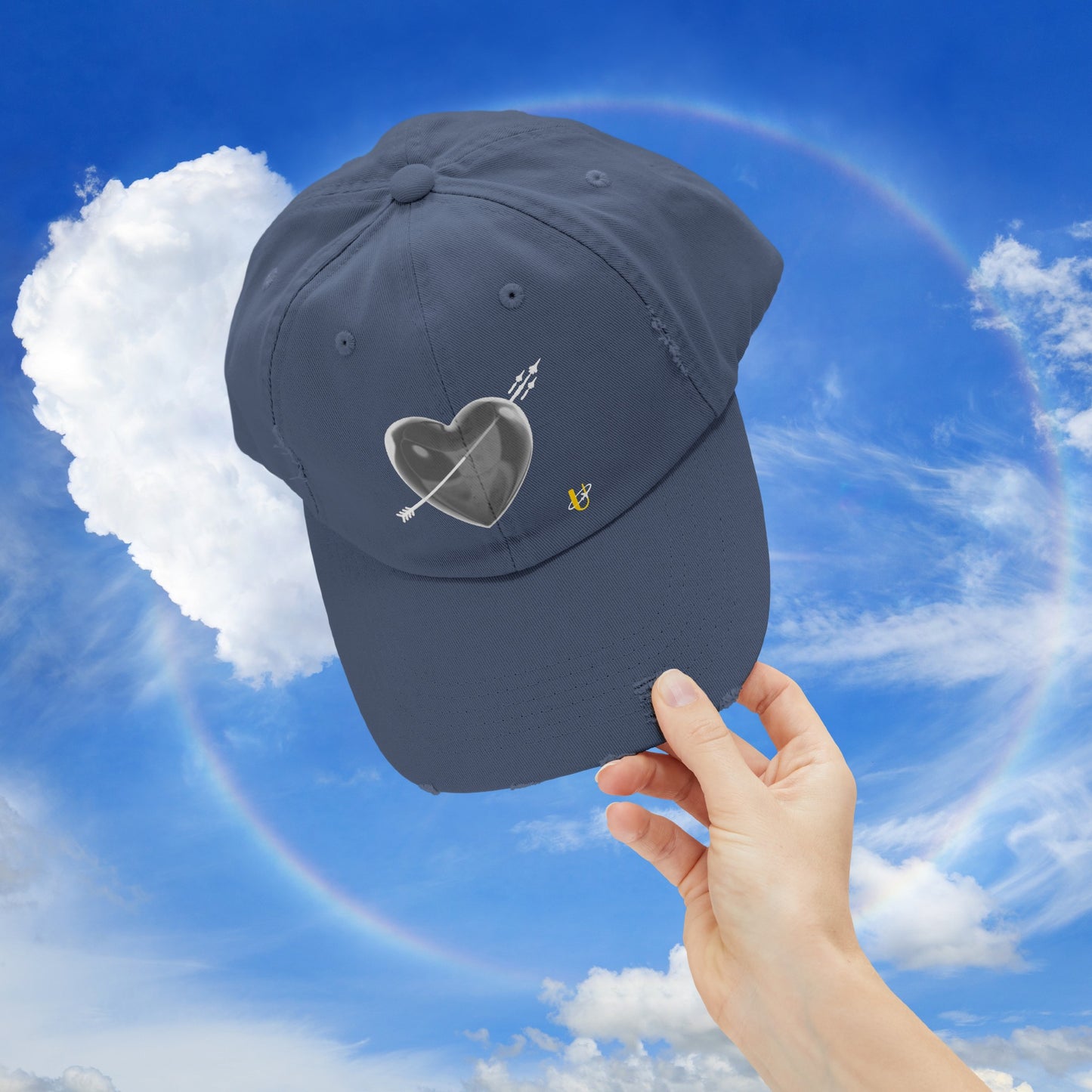 scotland blue "Love Jet" hat being held up in the sky