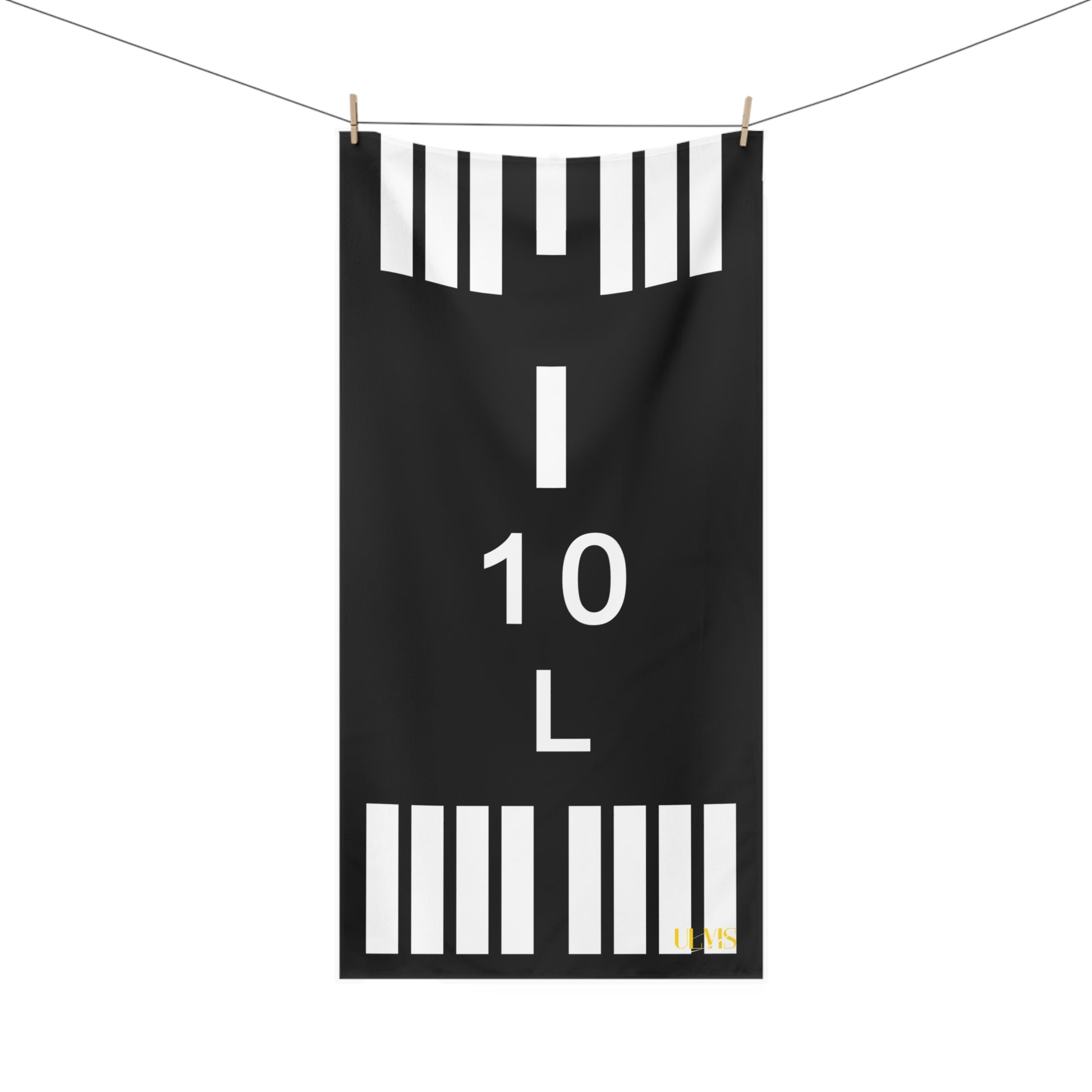 Aviation Runway beach towel hanging from clothing line