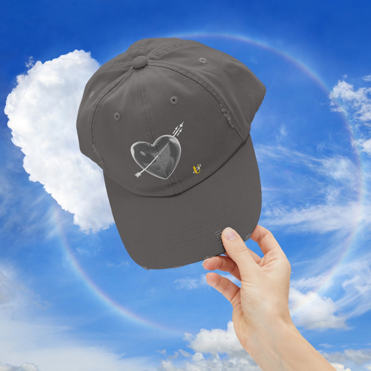 nickel "Love Jet" hat being held up in the sky