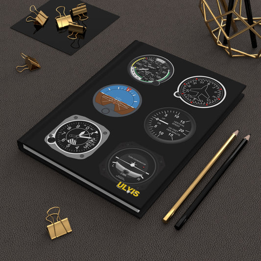 6-pack Flight Instrument Hard Cover Journal on a desk