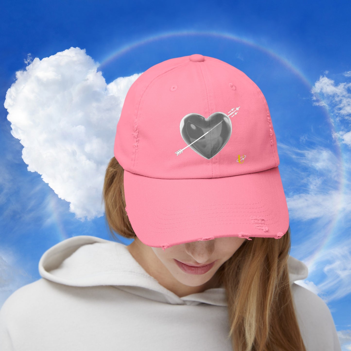 Woman wearing true pink "Love Jet" hat